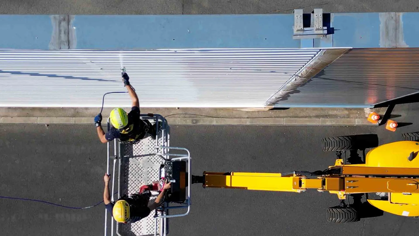 Pulverisation peinture bardage commercial 2KM